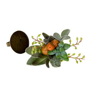 A fabulous holiday floral ring features succulents and orange berries for a lovely flowers-to-wear piece.