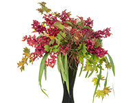 A dramatic and elegant elevated centerpiece combines cranberry orchids, peach roses, vine maple, hydrangea, viburnum berries, and tillandsia in an ebony vase.