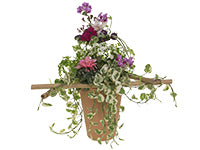 Arrangements that combine green plants and blooming plants are popular for Mother’s Day. Placing them in a larger pot and adding bamboo elevates the design, then it is topped off with a bouquet of fresh spring flowers for dramatic effect.