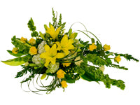 A beautiful casket spray mixes lemon colored lilies, golden roses, white hydrangeas, yellow snapdragons, aspidistra, myrtle, lily grass, and Bells of Ireland for a lovely effect.