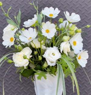 A luminous hand-tied bouquet using the Pantone color of the year, Cloud Dancer