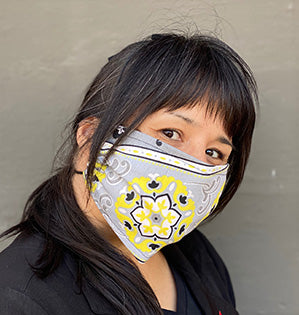 Floral Design Institute Teacher Marisa creates a mask that is stylish and easy to wear.
