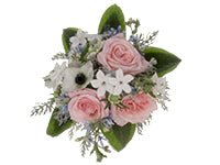 A bouquet of pink garden roses, dusty miller, blue tweedia, white anemone and scabiosa, and lamb's ear.