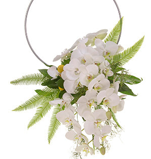 A wedding bouquet mixes white Phalaeonopsis orchids, craspedia, goanna claw, umbrella fern, Israeli ruscus, and cocculus on a gold hoop.