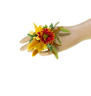 A fabulous floral ring is created with craspedia, hypericum berries, chrysanthemum, and dried bunny tails.