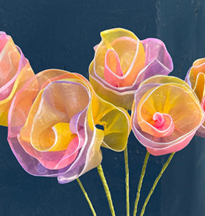 Roses made from ribbon.