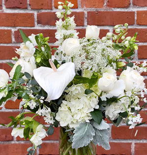 A modern white floral arrangement inspired by Pantone’s 2026 Color of the Year. 