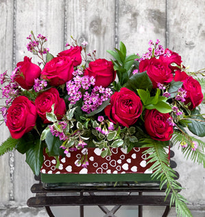 Valentine-ready arrangement featuring sumptuous garden roses with soft textures and swoon-worthy color. 