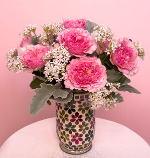 A lovely bouquet comprised of Millicent garden roses, Japanese silene, and dusty miller.