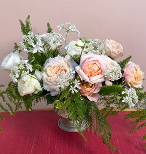 Exquisite roses from GardenRosesDirect.com, complemented by orlaya, meyeri fern, deflexus, and New Zealand pittosporum.
