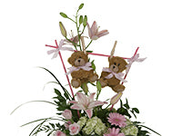 Whether it is a dozen red roses or a beautiful bud vase, mixing plush animals with flowers is an excellent way to enhance those Valentine’s Day floral designs.